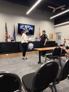 Officer Nicholas Hill being sworn in.