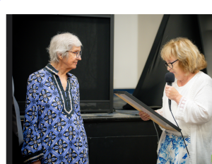 Rosemary Otzman and Rep. Reggie Miller