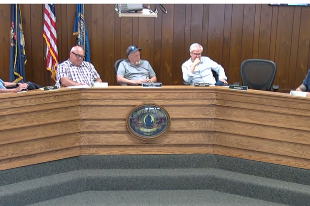 A screen capture from a video of the Sumpter Township trustee meeting.